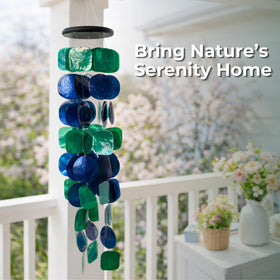 Solange & Frances wind chimes on a front porch add coastal charm and light sound.