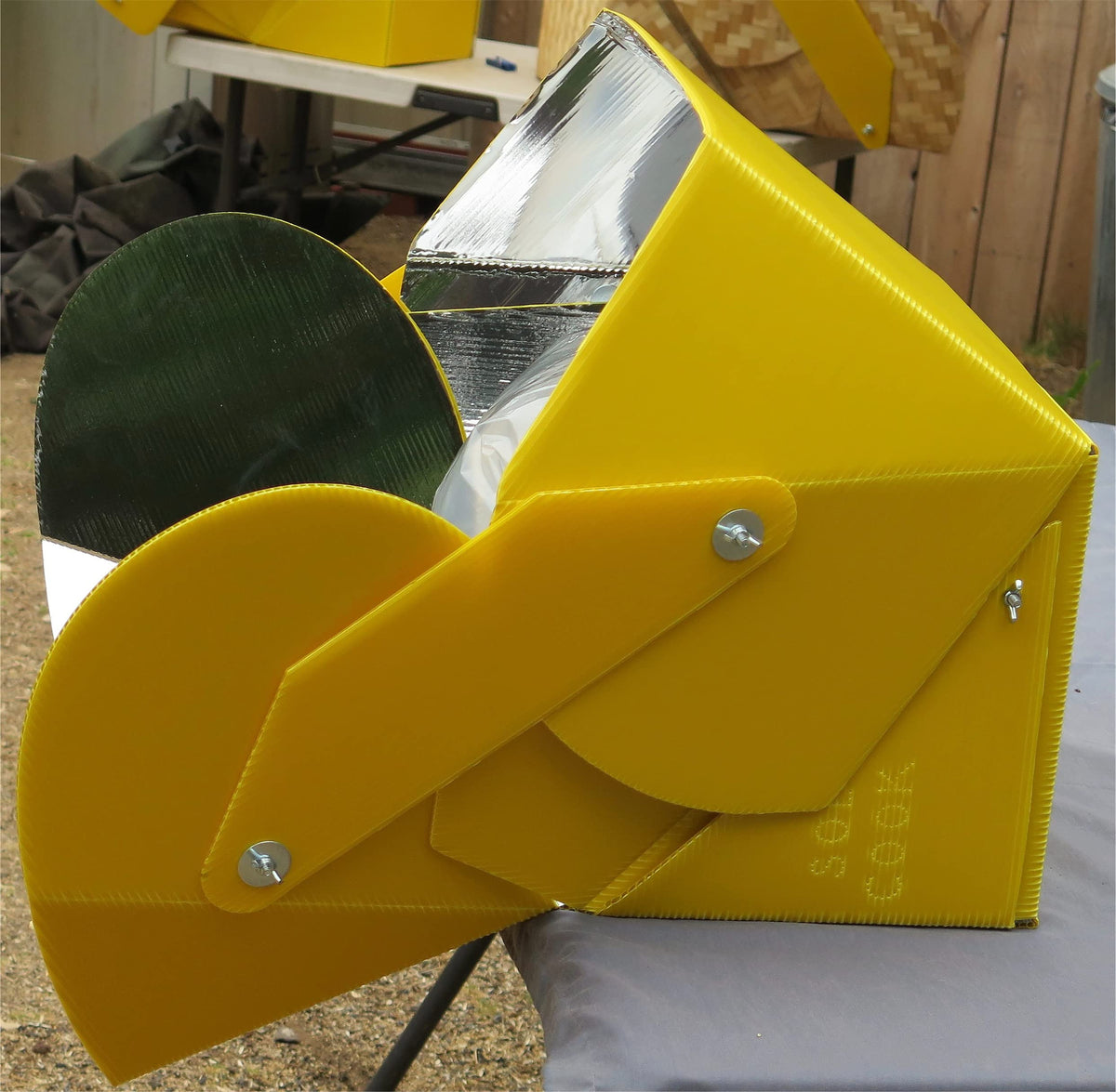 SolCook solar cooker built from durable polypropylene for outdoor use.