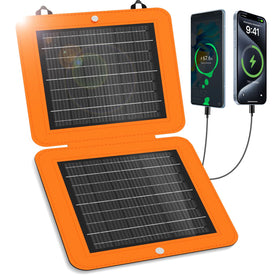 SOLUPUP 10W solar panel folded beside a backpack for portable charging on outdoor trips