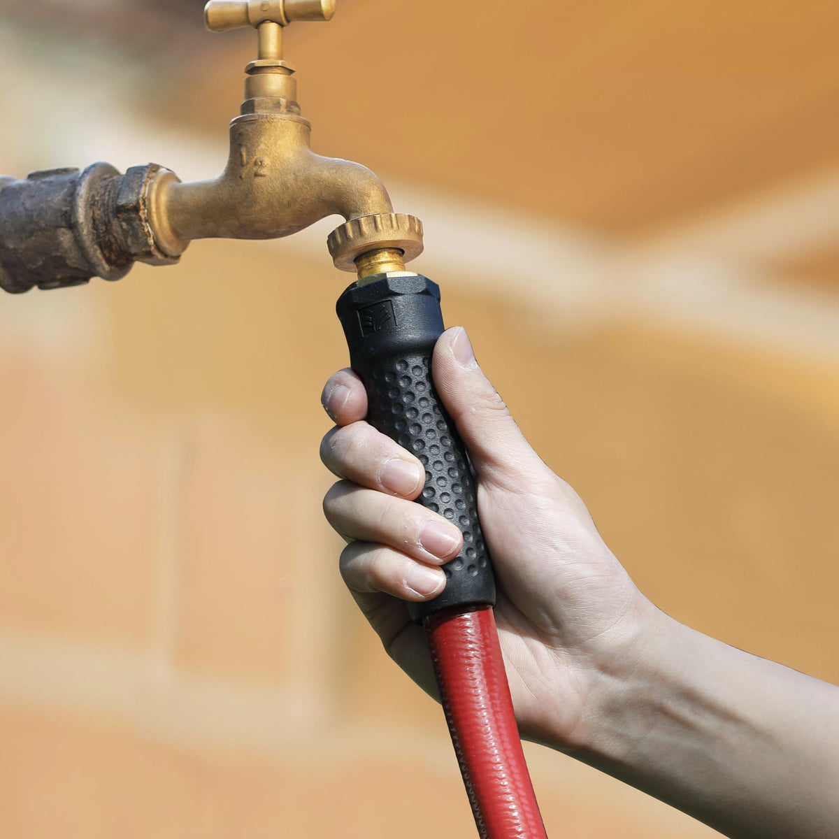 Solution4Patio 50-foot reach enables distant watering with fewer moves.