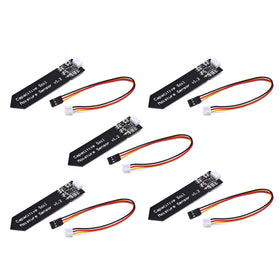 Songhe capacitive soil moisture sensor in soil for real-time readings.