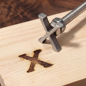 Sosation branding irons in use on bread for custom markings