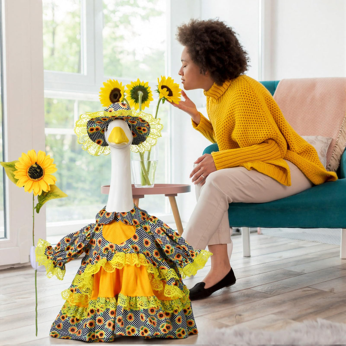 Soulchen sunflower ensemble on porch goose brightens garden ambiance.