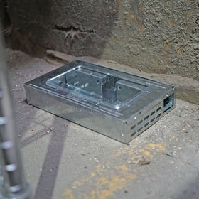 Compact two-trap package ready for discreet placement around the home.