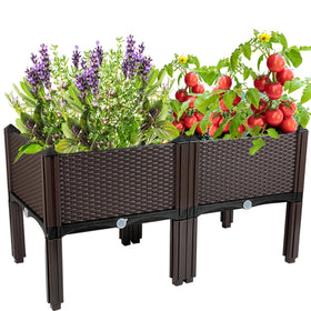 Souwuokoo elevated planter with legs for stable outdoor use on patios.