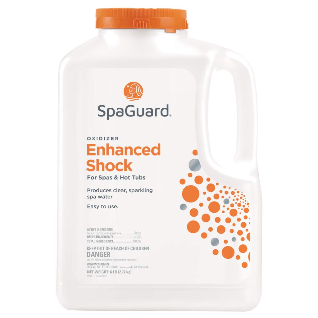 SpaGuard Enhanced Shock bottle pour demonstrating rapid 15-minute treatment.