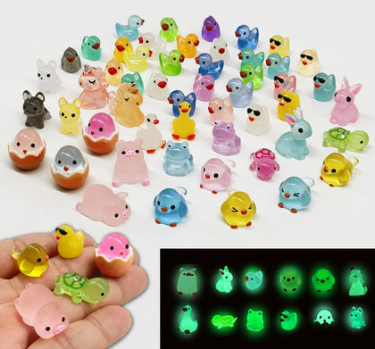 SparkleFab glow mini resin ducks illuminate your garden after sunset.