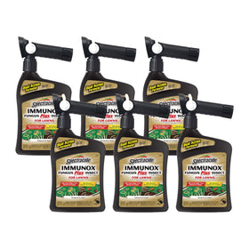 Spectracide Immunox quickflip sprayer in action for efficient lawn treatment.