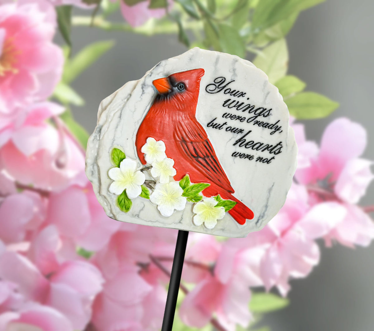 Spoontiques garden stake showcases durable resin for long-lasting yard decor.