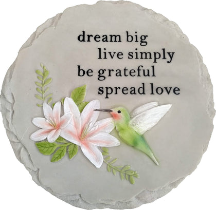 Spoontiques hummingbird stepping stone enhances outdoor decor and welcomes guests along garden paths.