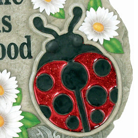 Spoontiques Resin outdoor stone resists weather while brightening pathways.