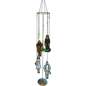 Spoontiques Wizard of Oz wind chime hanging in sunlit garden adds whimsical yard decor.