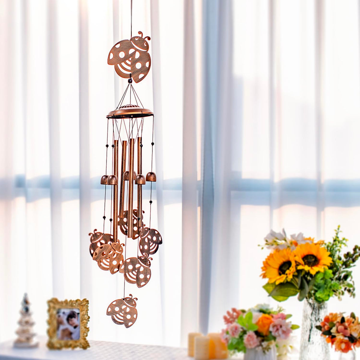 SRDJXY Ladybug wind chimes S-hook detail shows sturdy hanging solution.