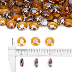Stanbroil caramel luster glass drops arranged in a fire pit for ambient glow