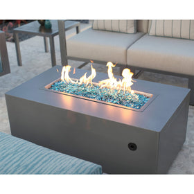 Decorative use of Stanbroil Caribbean Blue Luster fire glass drops in landscaping