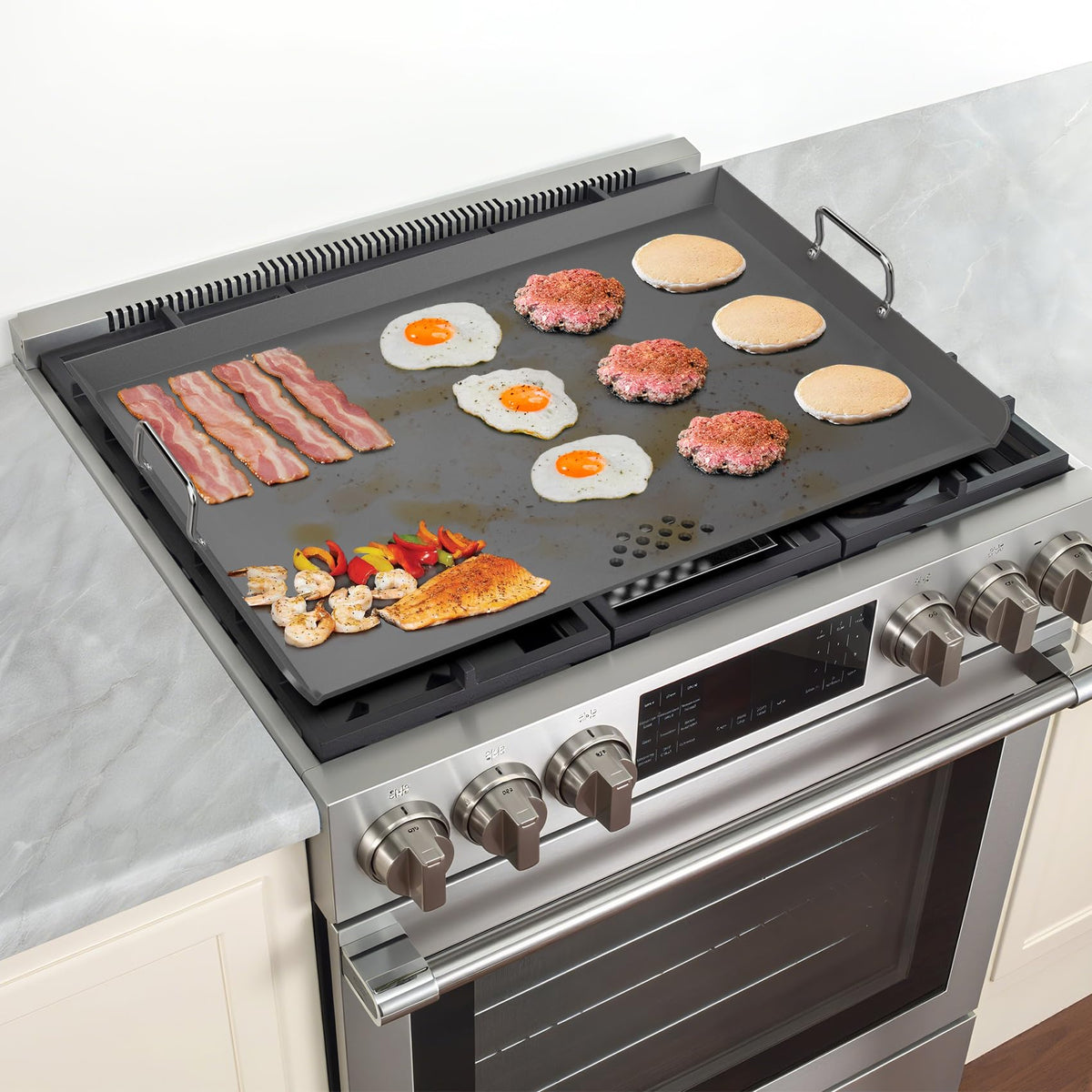 Stanbroil griddle with spacers ready for multiple cooktops
