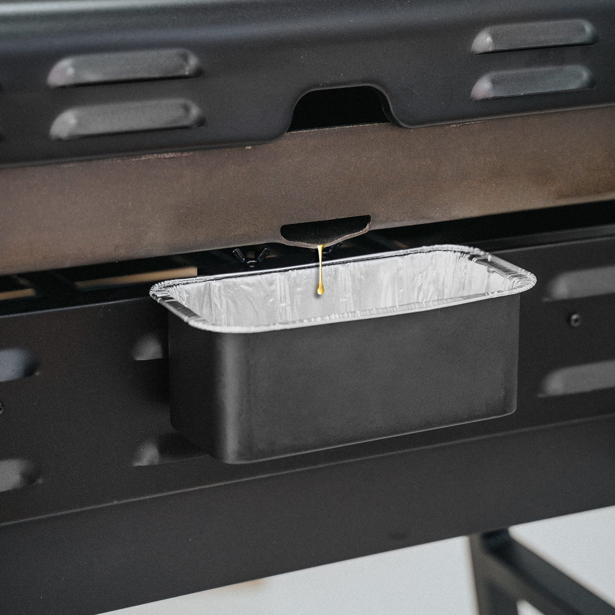 Stanbroil griddle accessory enabling effortless grease collection and cleanup.