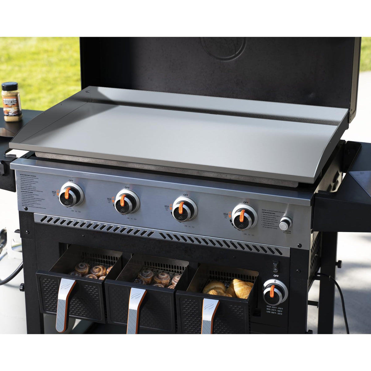 Stanbroil griddle top shows removable handles for easy transport