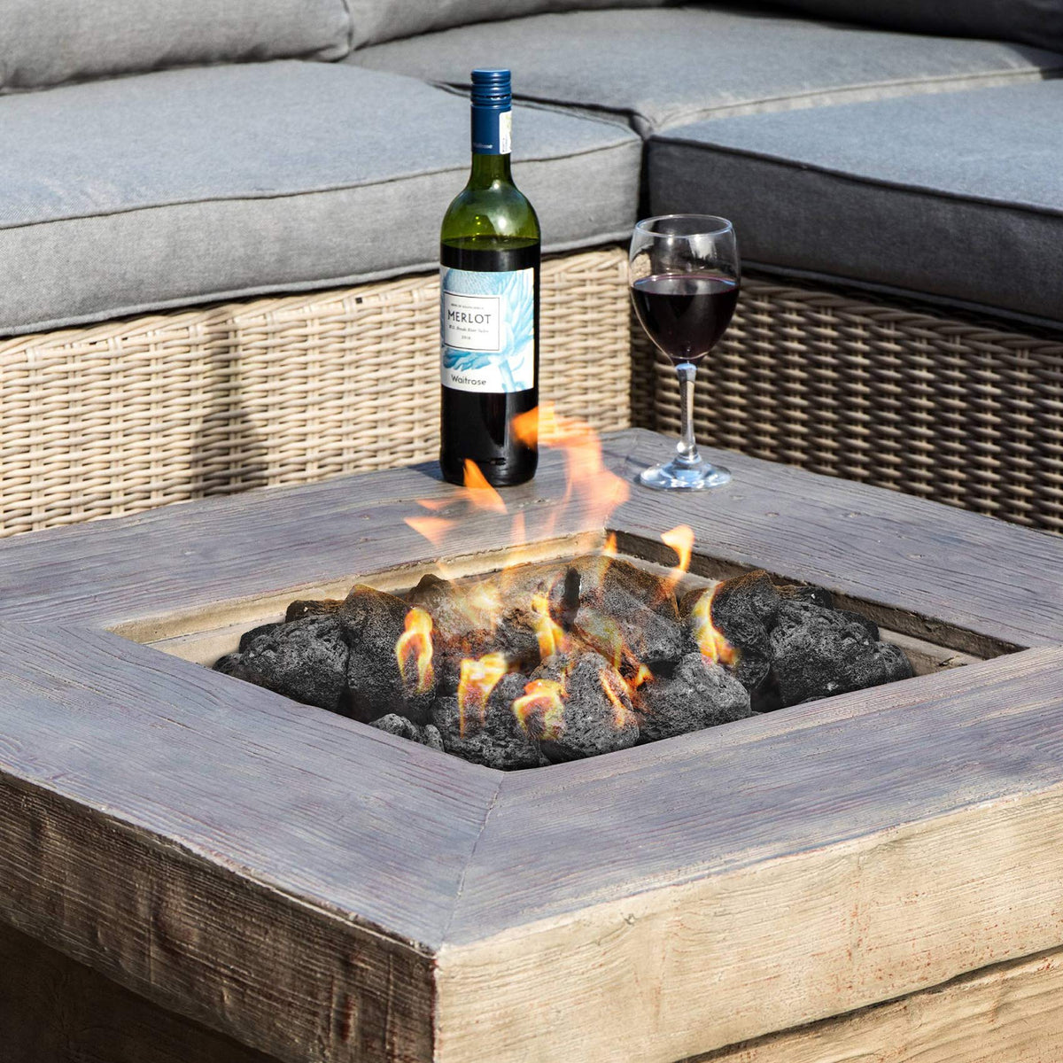Stanbroil lava rock granules with gas logs add depth and realistic contrast.