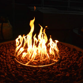 Stanbroil lava rock granules arranged in an indoor outdoor fireplace scene for depth.