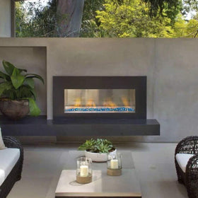 Stanbroil outdoor landscape accents using Caribbean Blue Luster fire glass diamonds.