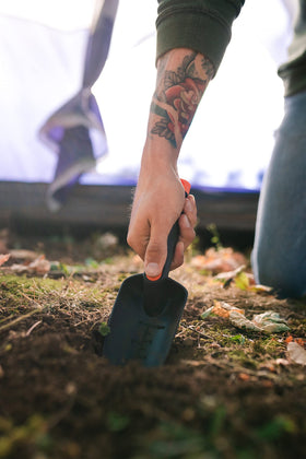 Stansport compact 11-inch trowel profile for camping and gardening tasks.