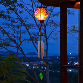 Starsoul wind chimes use weather resistant metal and glass for lasting outdoor beauty.