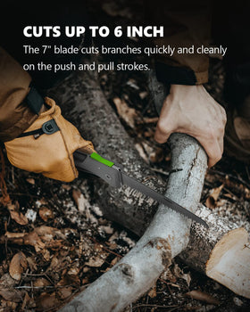 StayGROW pruning saw cutting a branch, versatile for pruning and outdoor use.