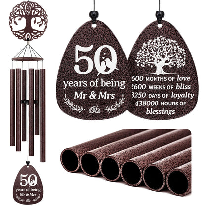 SteadStyle 50th anniversary wind chime tree of life hanging in garden for calming ambiance.