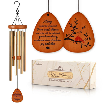 SteadStyle anniversary wind chimes in a garden create a romantic focal point.
