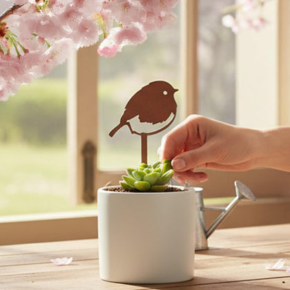 STEELDECO Chickadee stake adds natural charm to pots.