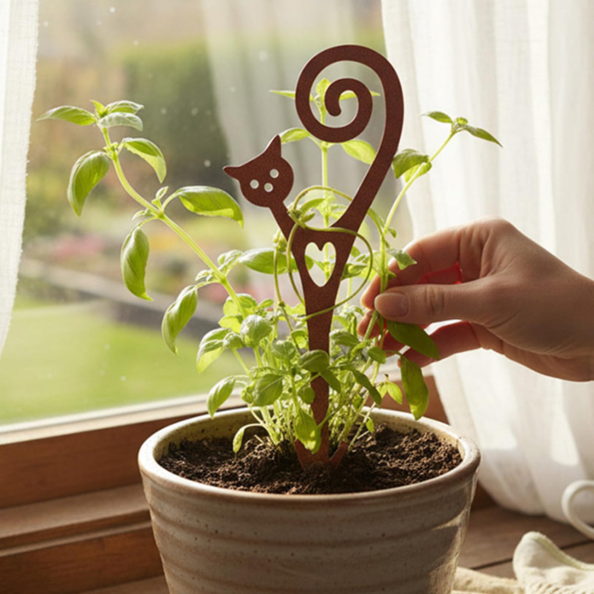 STEELDECO garden accent cat figurine boosts curb appeal on beds.