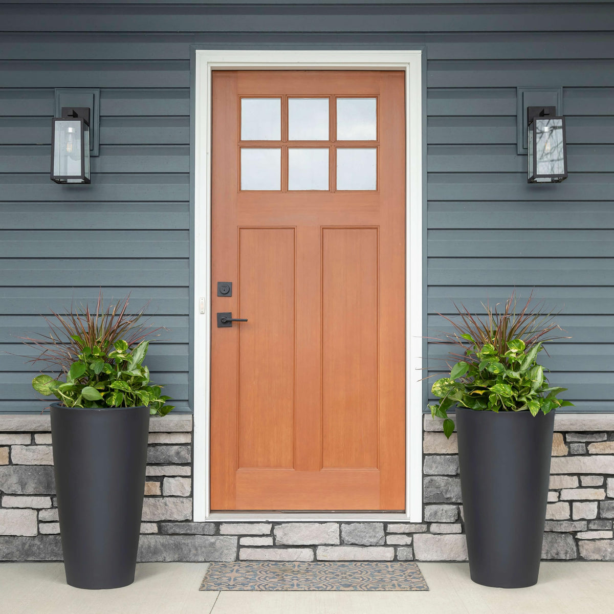 Step2 Tremont planter on patio corner demonstrates durable weather-resistant resin