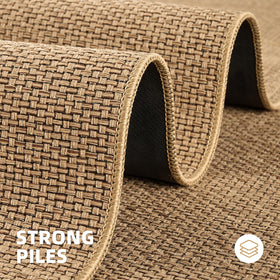 StepAura door mat absorbs moisture and scrapes dirt from shoes.