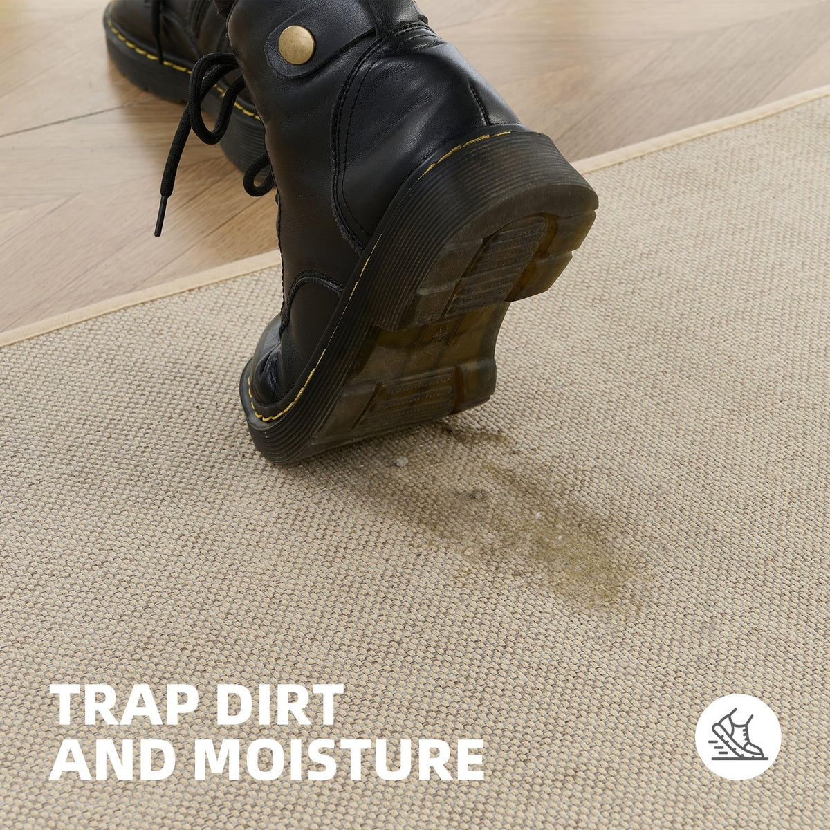 StepAura 24x36 mat under door demonstrating compact 7 mm profile
