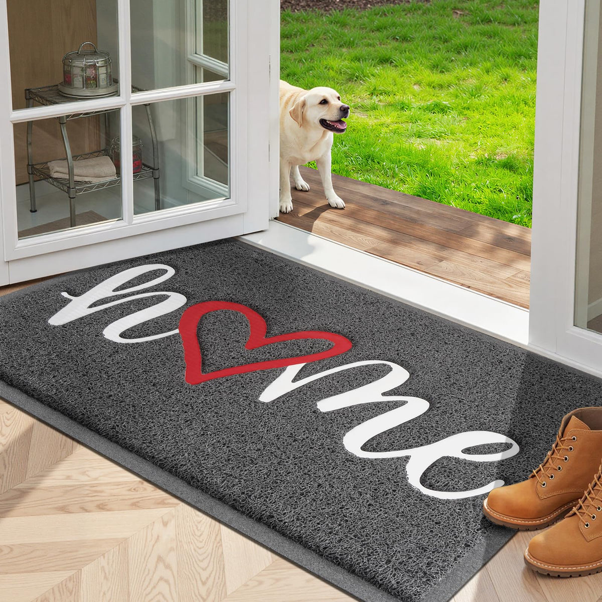 StepLively grey door mat greets guests at the front door with a durable, non-slip design.