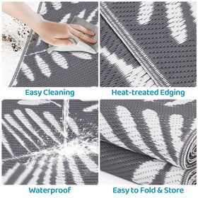 StepRite 4x6 rug in use on a sunny patio with banana leaf print.