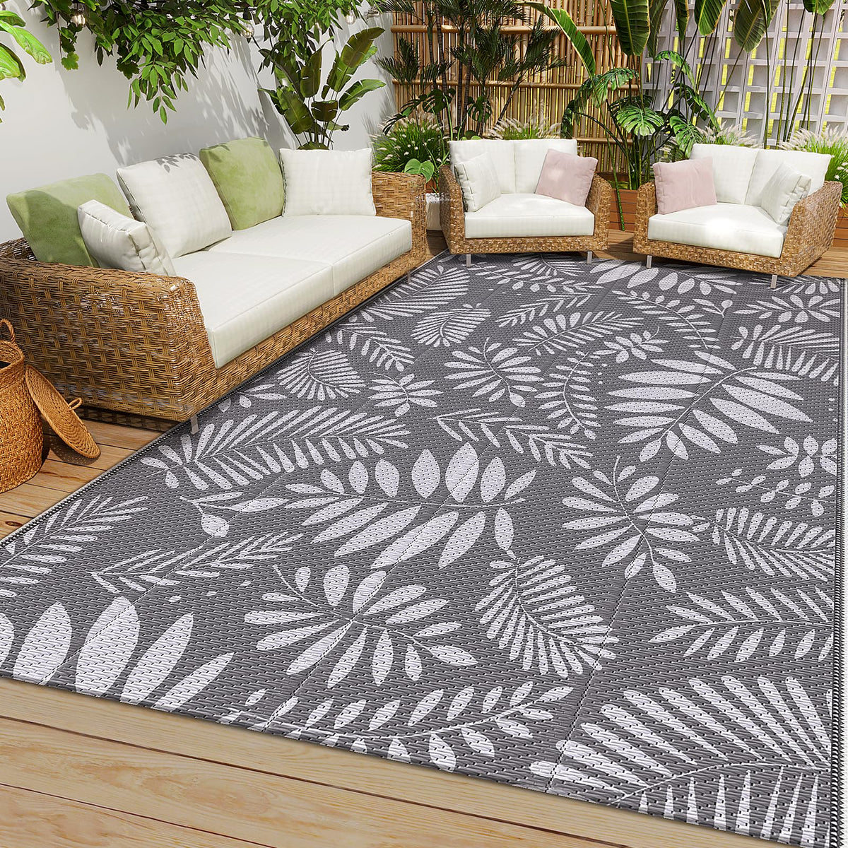 StepRite outdoor rug with banana leaf pattern offers durable waterproof performance for patios and decks.