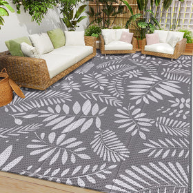 StepRite Outdoor Rug banana leaf pattern in 8x10 size for patio spaces.
