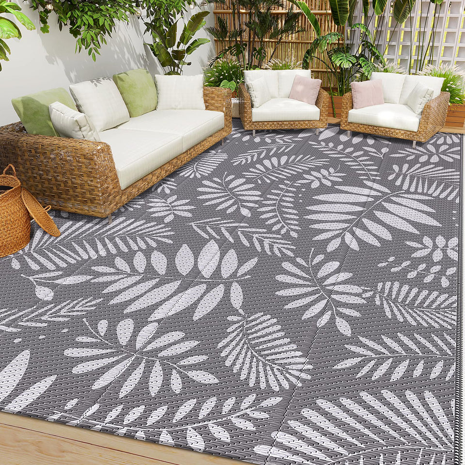 StepRite Outdoor Rug banana leaf pattern in 8x10 size for patio spaces.