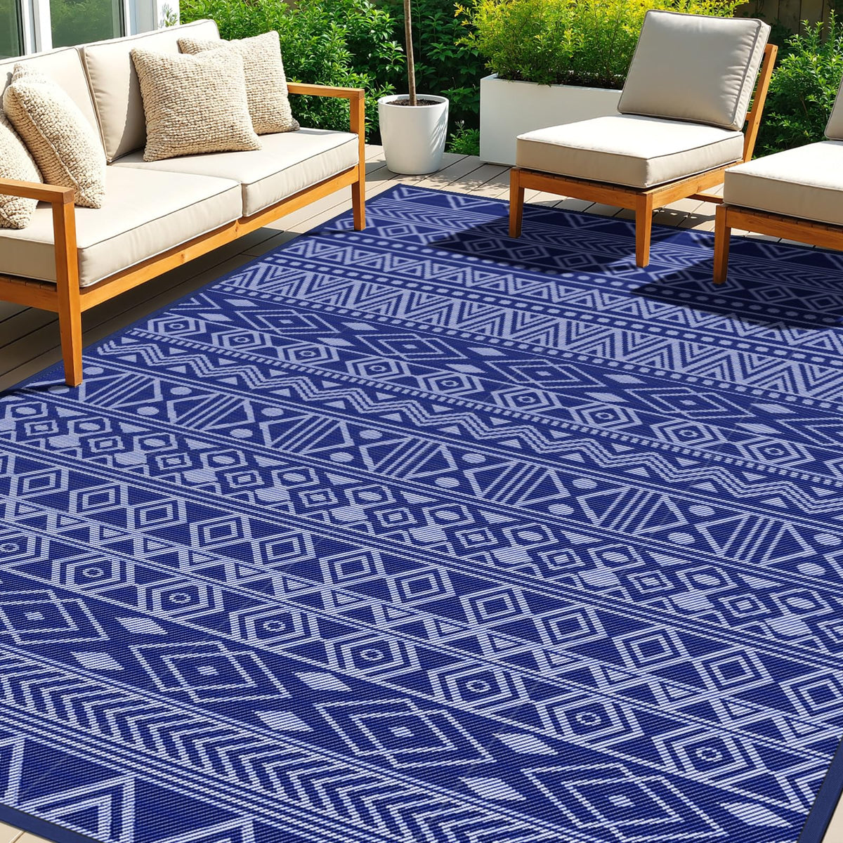 StepTastic outdoor rug in blue-white pattern for patios, waterproof and easy to clean