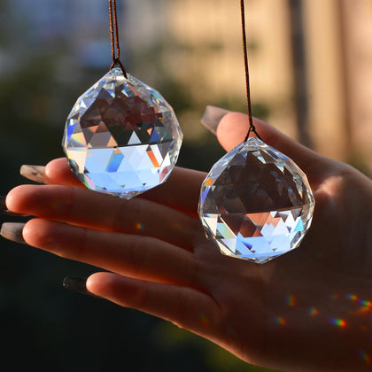 Stino 2Pcs clear ball crystal suncatchers hanging in sunny window casting colorful light
