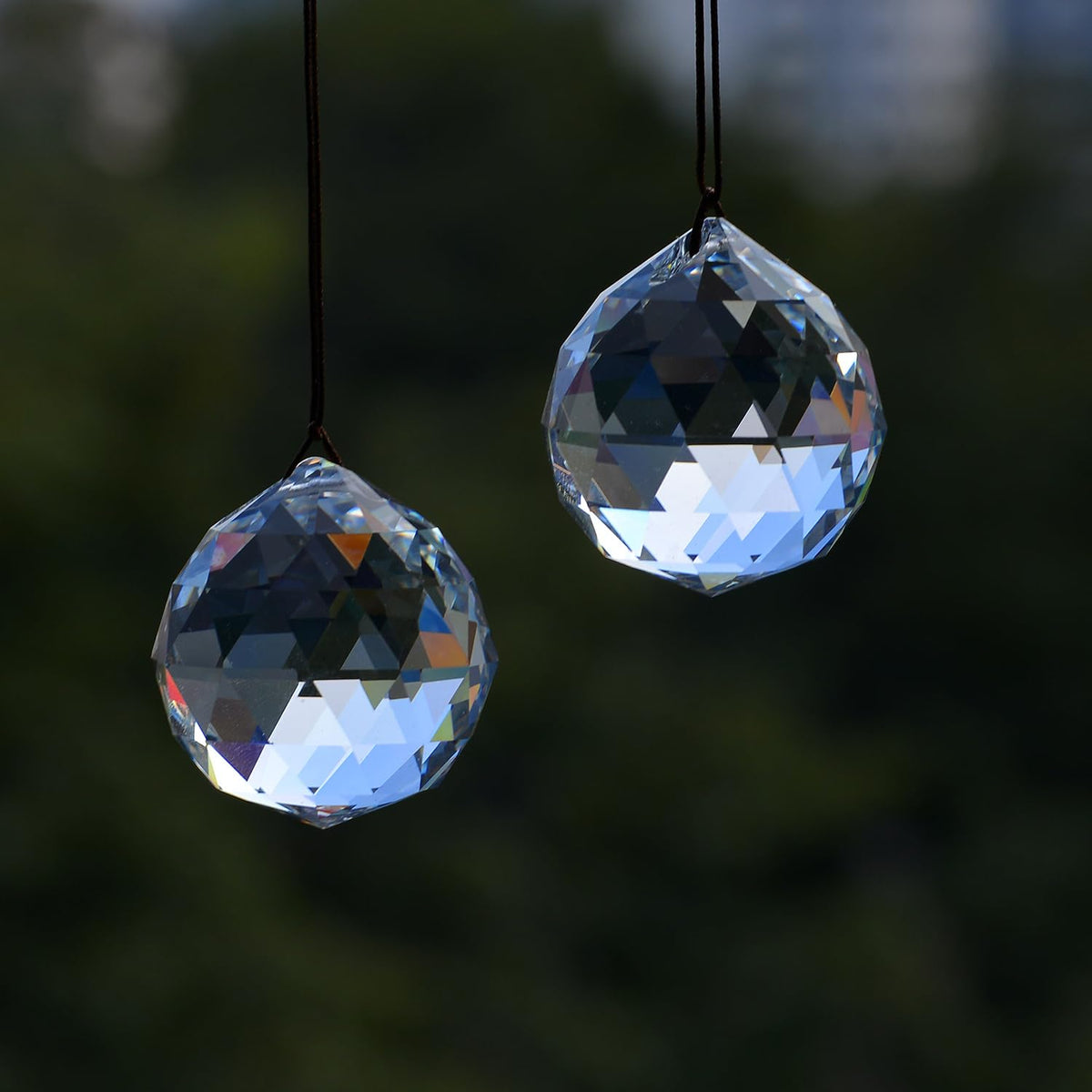 Stino ball prism suncatcher acts as a rainbow maker in sunlight