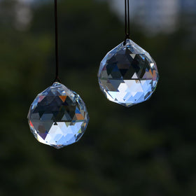 Stino ball prism suncatcher acts as a rainbow maker in sunlight