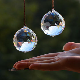Stino crystal prisms hang on a car mirror for subtle sparkle