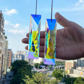 Stino prism suncatcher amber rectangle crystal casts warm rainbow spots in sunlight
