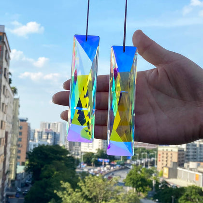 Stino prism suncatcher amber rectangle crystal casts warm rainbow spots in sunlight