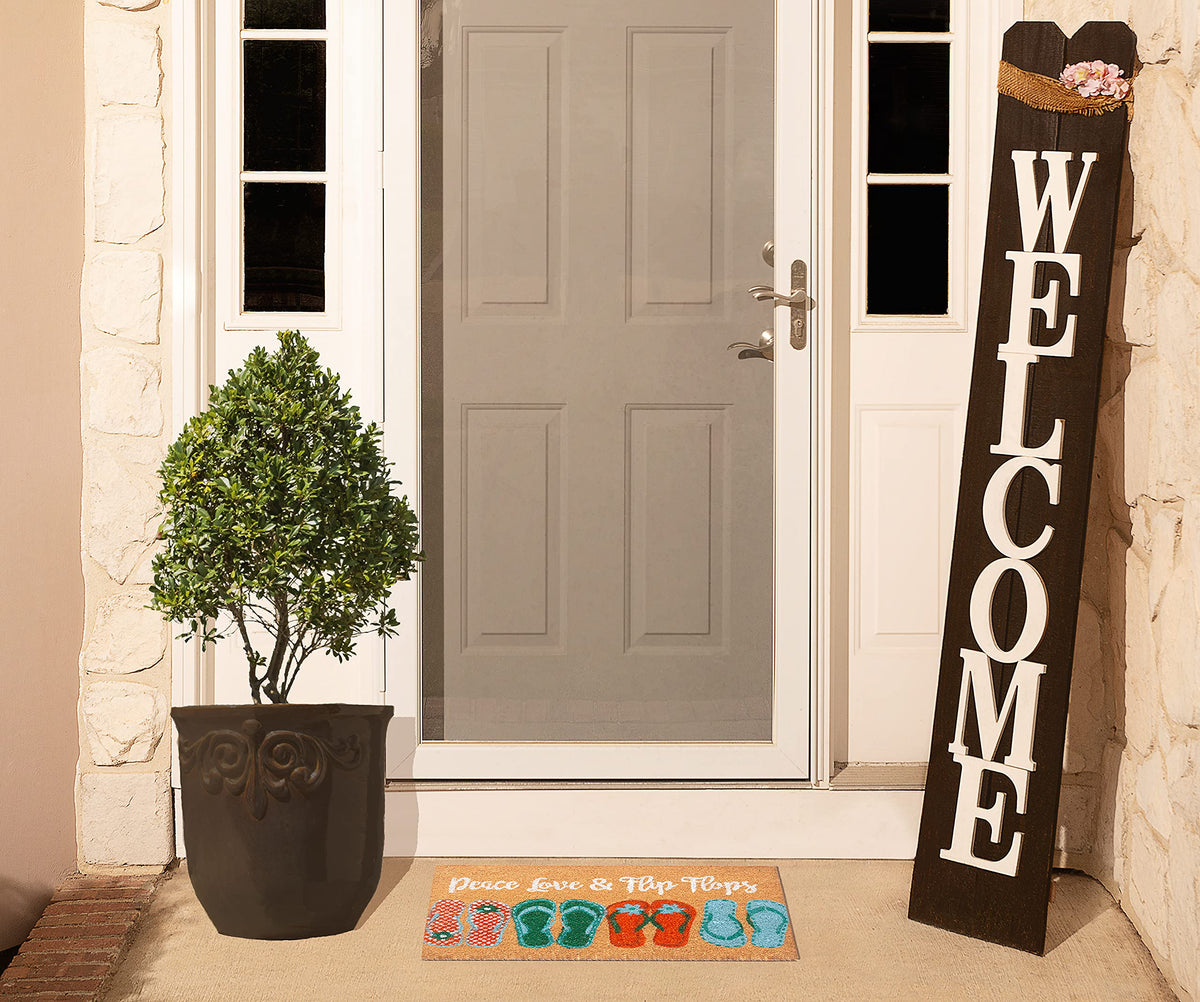 Storm Stopper mat shows coir texture and non-slip backing for outdoors.