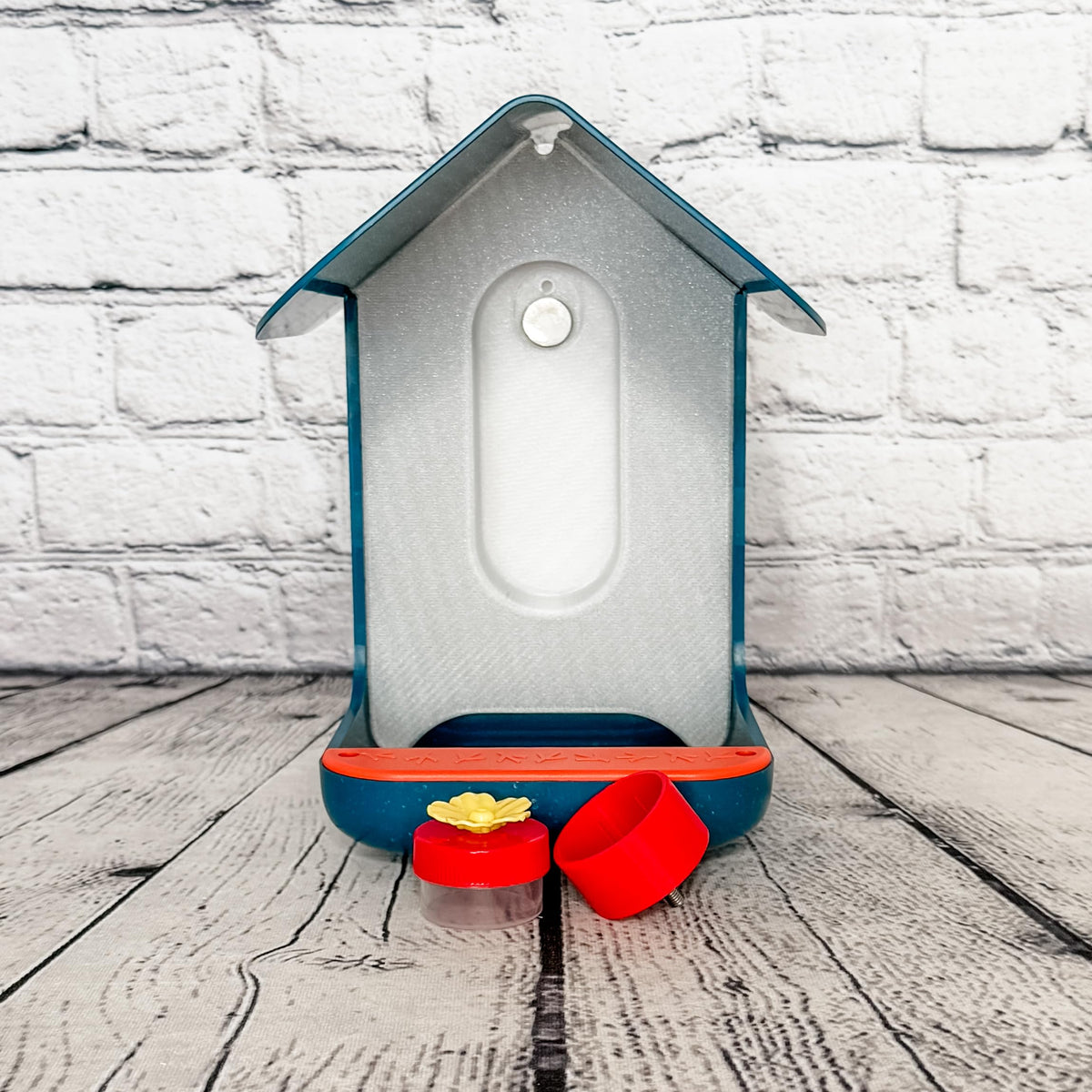 UV-resistant PETG material keeps the red holder vibrant outdoors