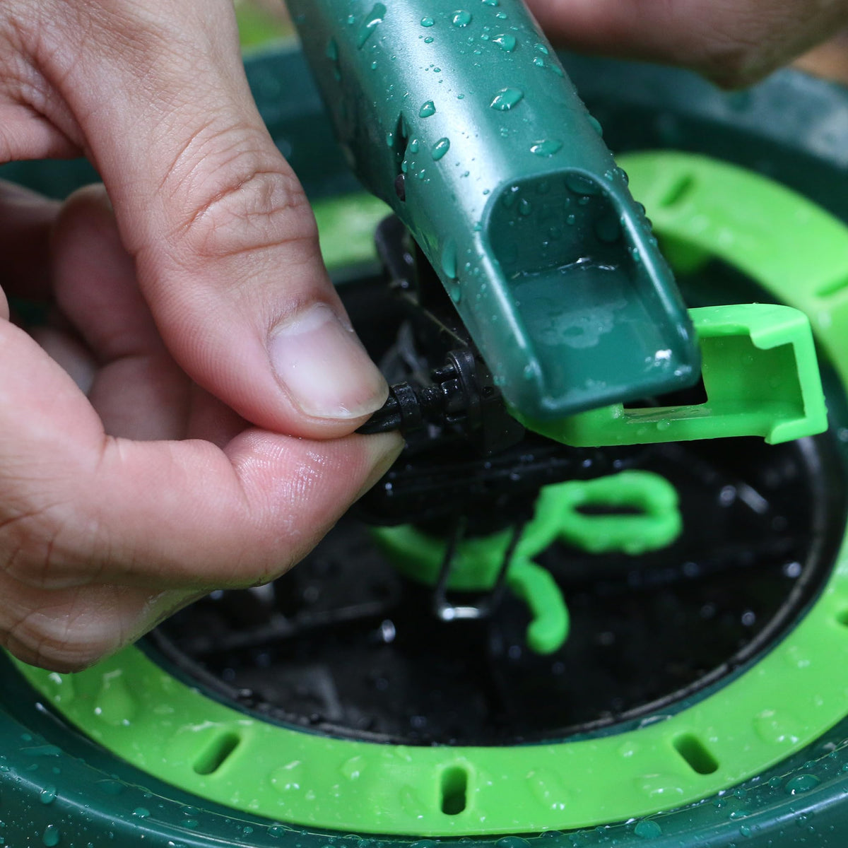 STYDDI Pattern Impulse Sprinkler with a sturdy sledge base on grass.
